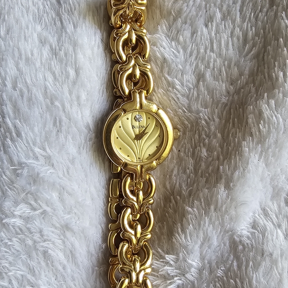 Bulova Quartz Gold Women\'s Watch With Diamond Chip